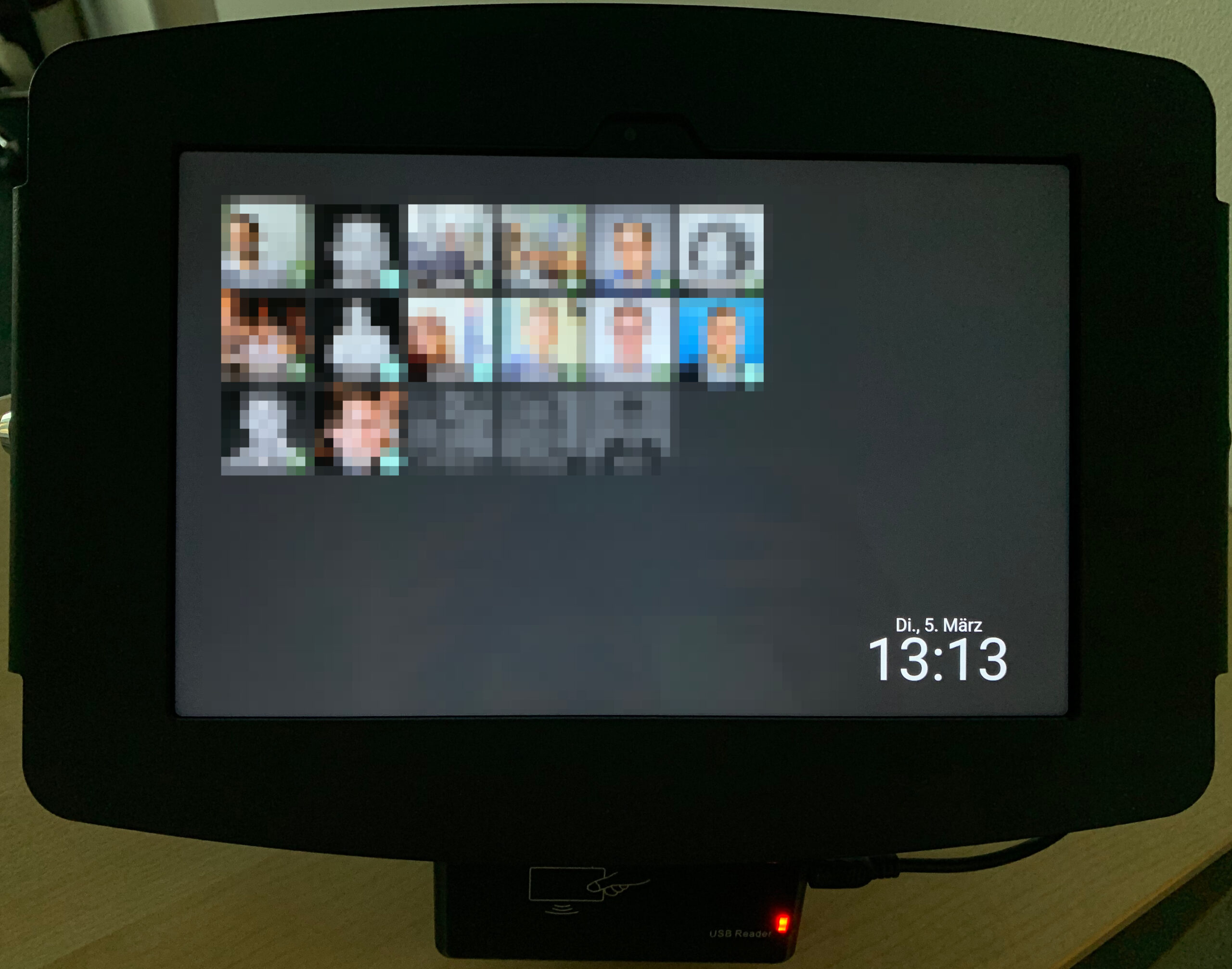 The fully assembled check-in/out terminal in its enclosure with stand and RFID reader