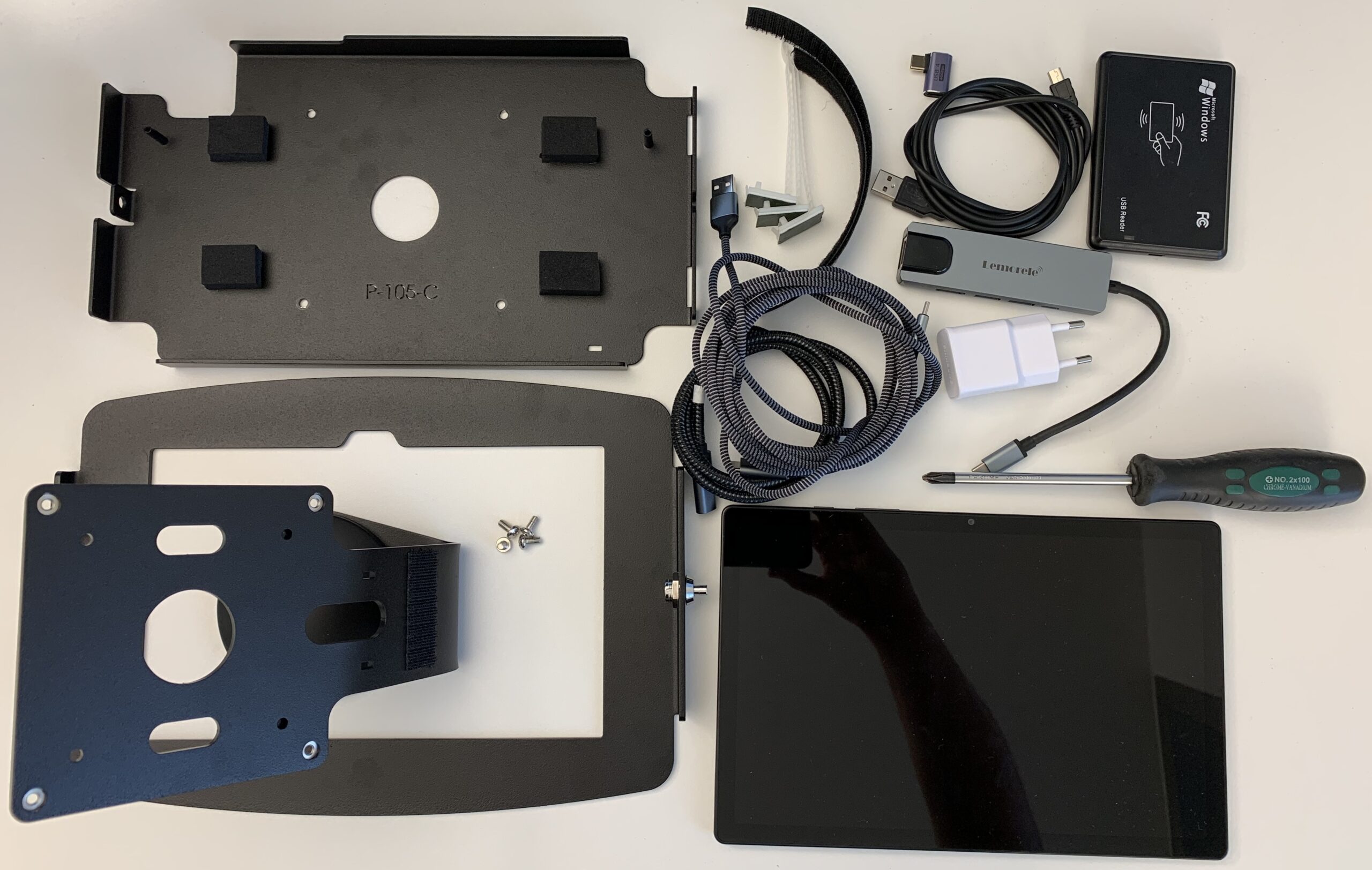 A strip of hook-and-loop tape is attached for the later mounting of the RFID reader