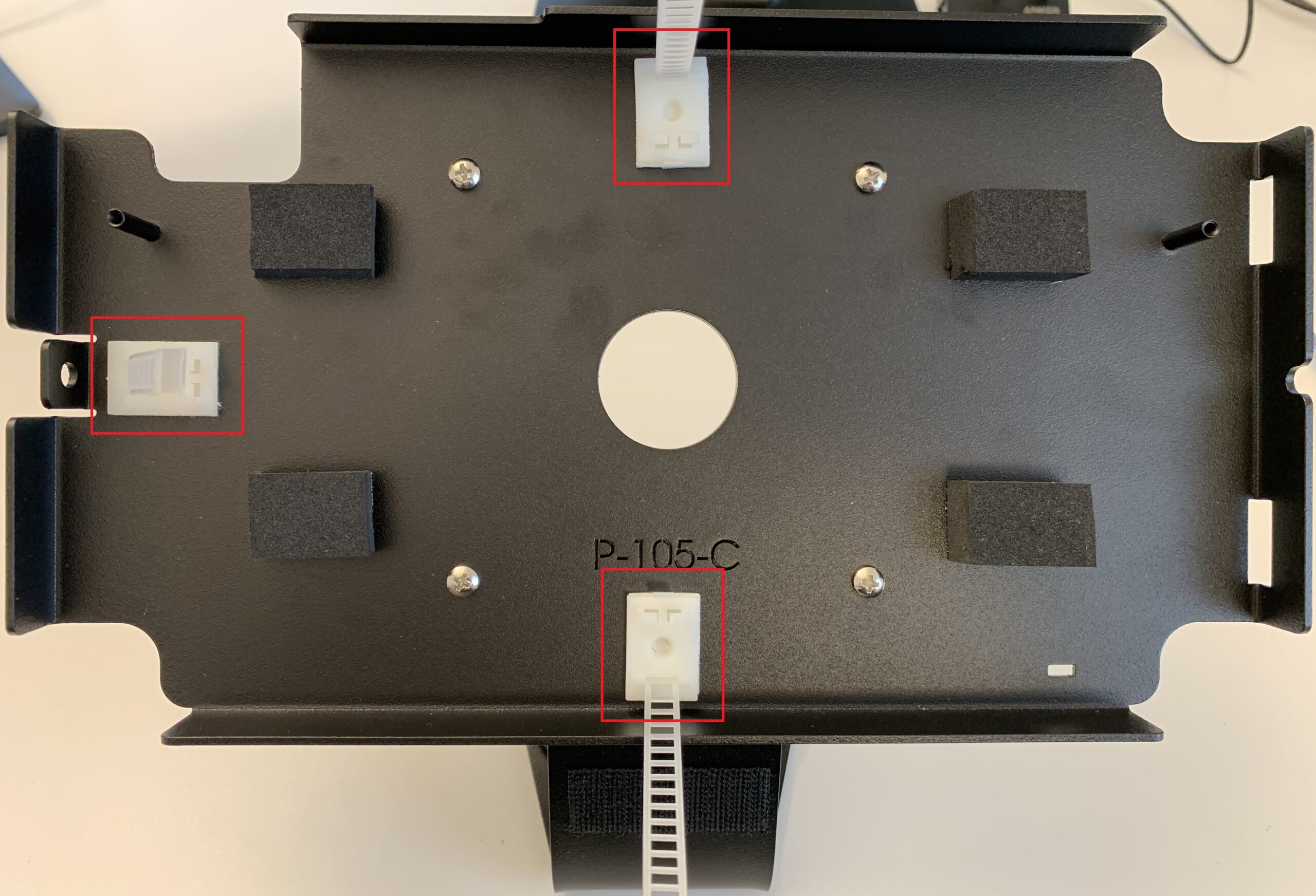 The matching piece of hook-and-loop tape is stuck onto the RFID reader and the USB-C dongle