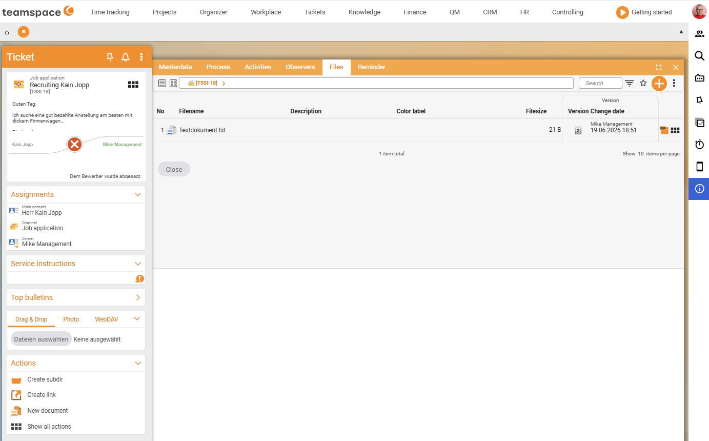 File tab of a ticket with an empty file table, on the left the Actions sidebar (create subdirectory, create link, new document) and the Upload sidebar with the Drag & Drop, Photo and WebDAV tabs